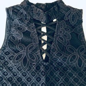 Sleeveless lace up blouse